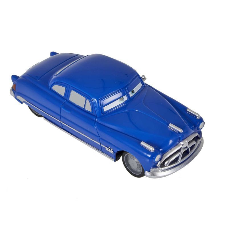 Детска състезателна количка Disney Pixar Cars: Pull-Back Doc Hudson – Оригинален автомобил Док Хъдсън в голям мащаб 1:43 с инерционен механизъм (3+ години)