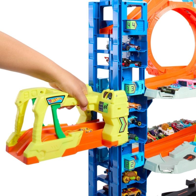 Гигантски детски гараж Hot Wheels City: Ultimate Garage – Писта на 4 нива с автоасансьор, огнен дракон, над 50 паркоместа и 2 колички (4+ години)