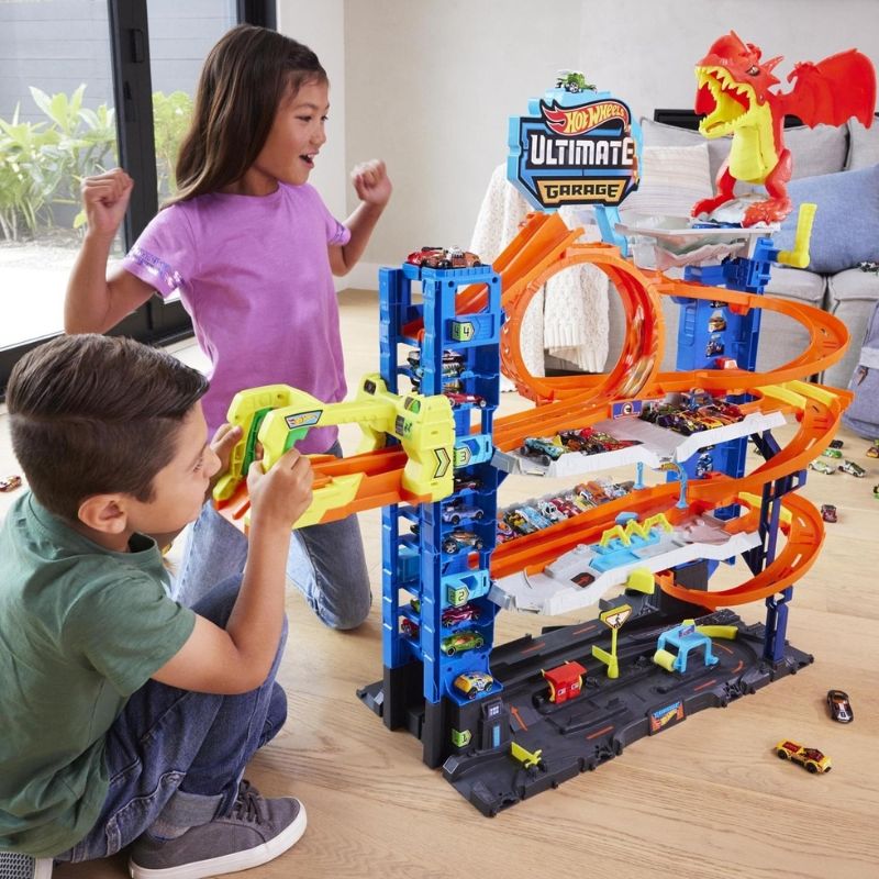 Гигантски детски гараж Hot Wheels City: Ultimate Garage – Писта на 4 нива с автоасансьор, огнен дракон, над 50 паркоместа и 2 колички (4+ години)