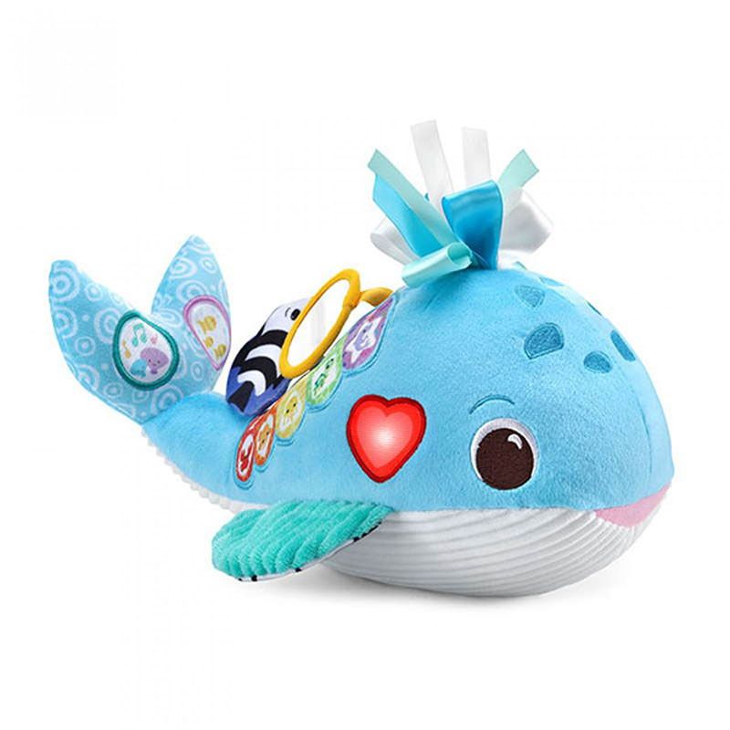 Бебешка мека интерактивна играчка VTech Snuggly Ocean Whale – Плюшен кит с пиано клавиши, 9 песни, 15 мелодии и фрази на английски език (3–24 месеца)